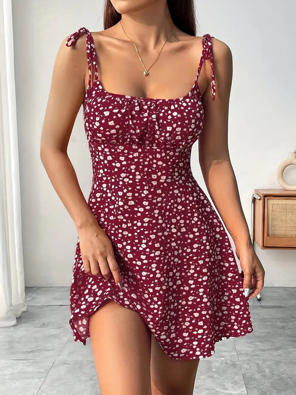 Vestido mini floral para mulher com alças atadas e bainha rodada